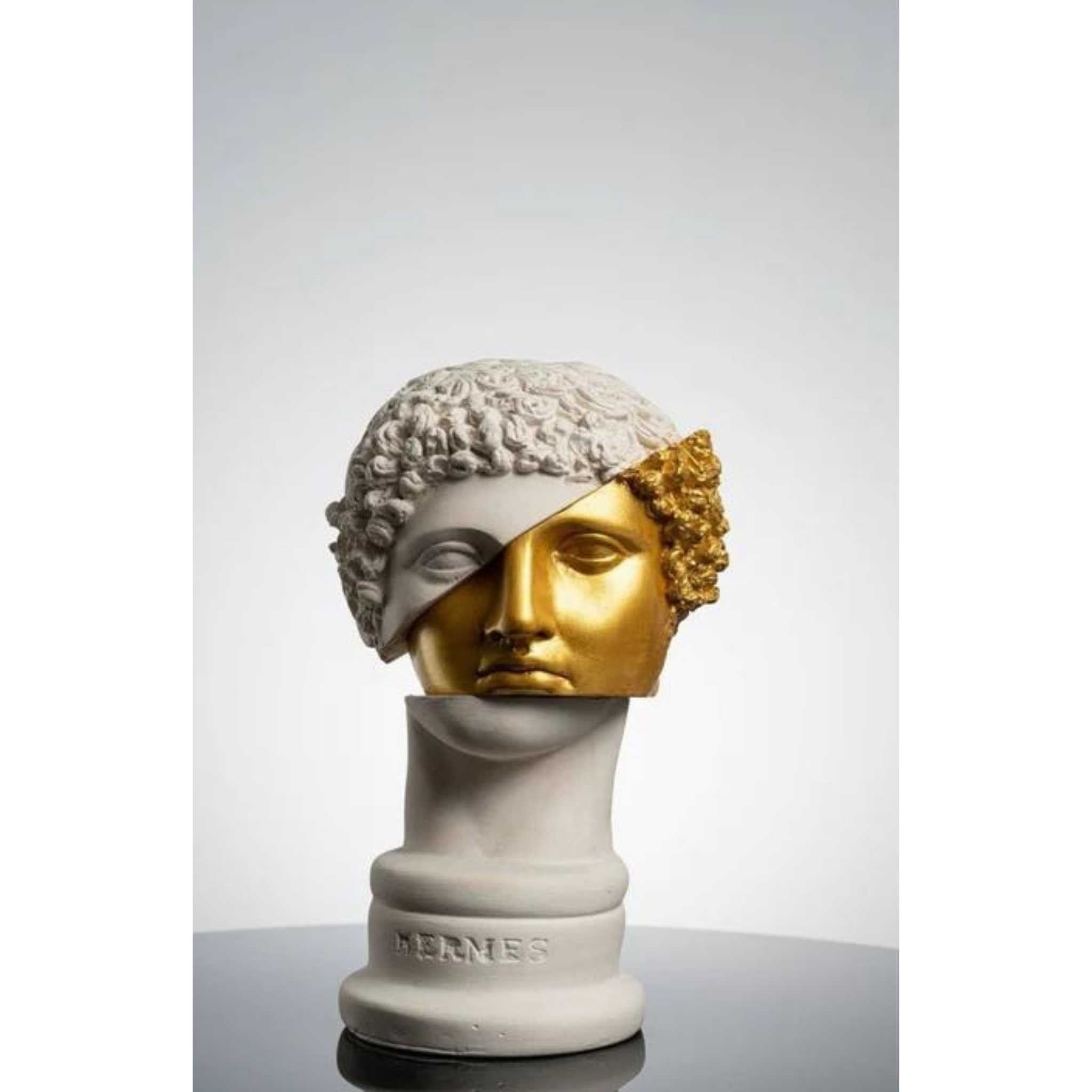 golden boy sculpture