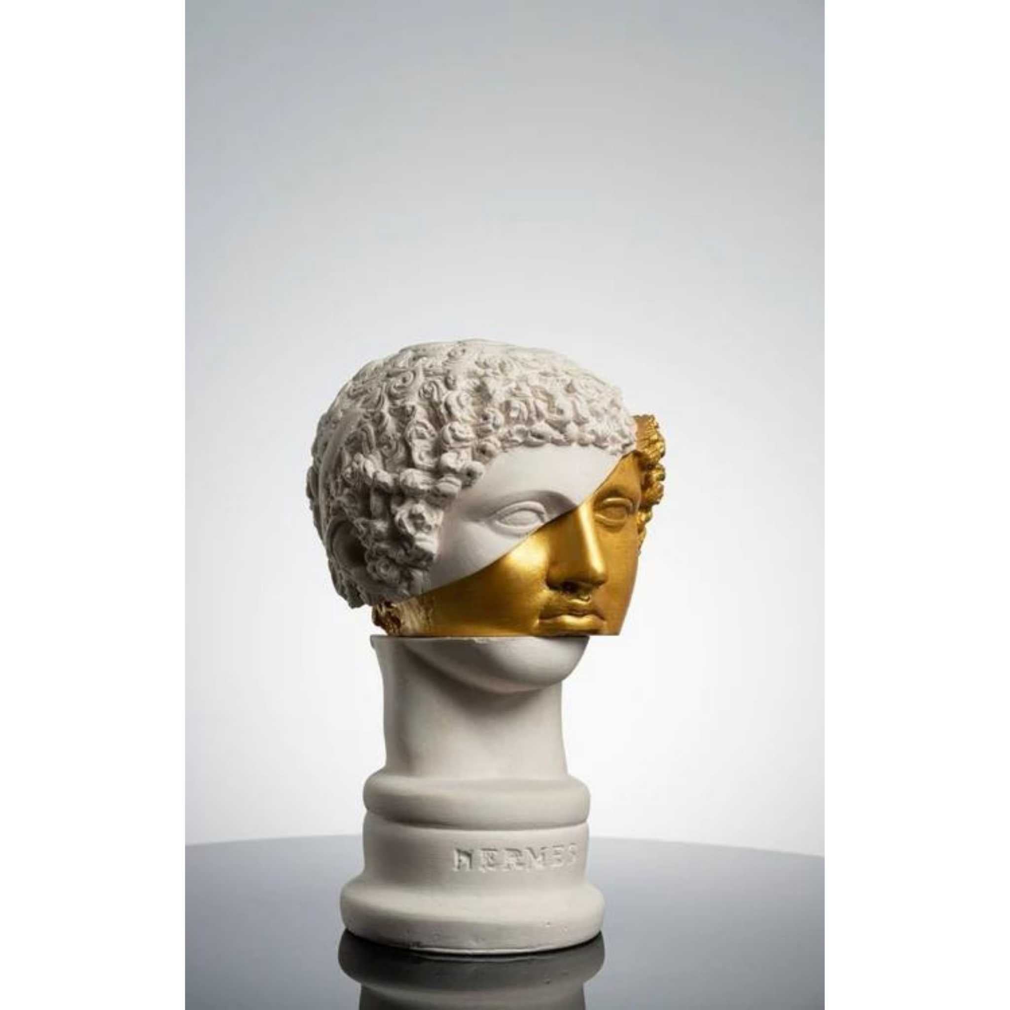 golden boy sculpture