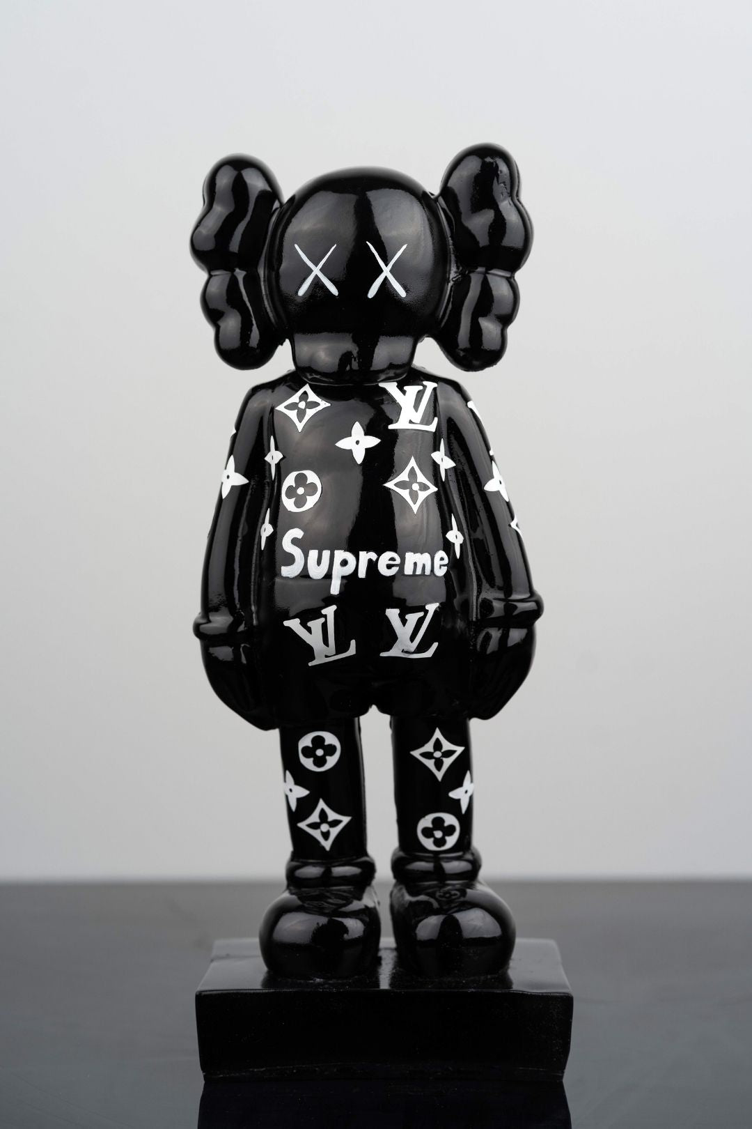 supreme kaws