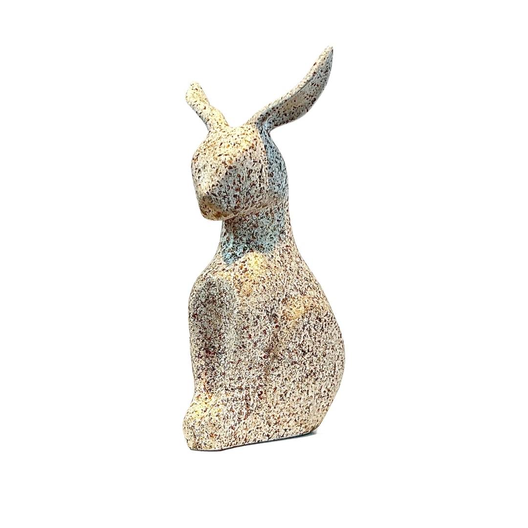 Stonebound Serenity: Abstract Rabbit Sculpture