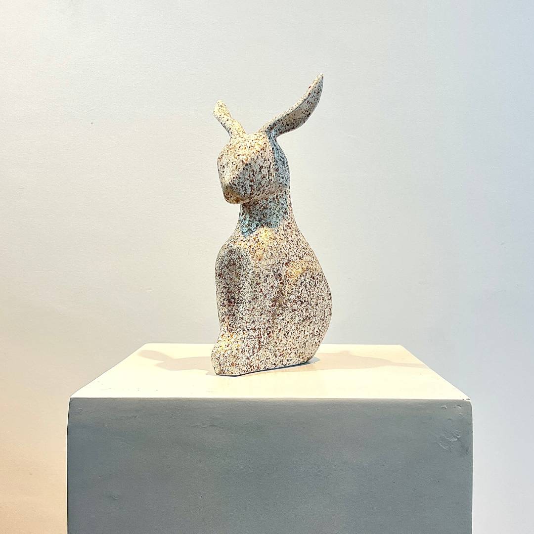 Stonebound Serenity: Abstract Rabbit Sculpture