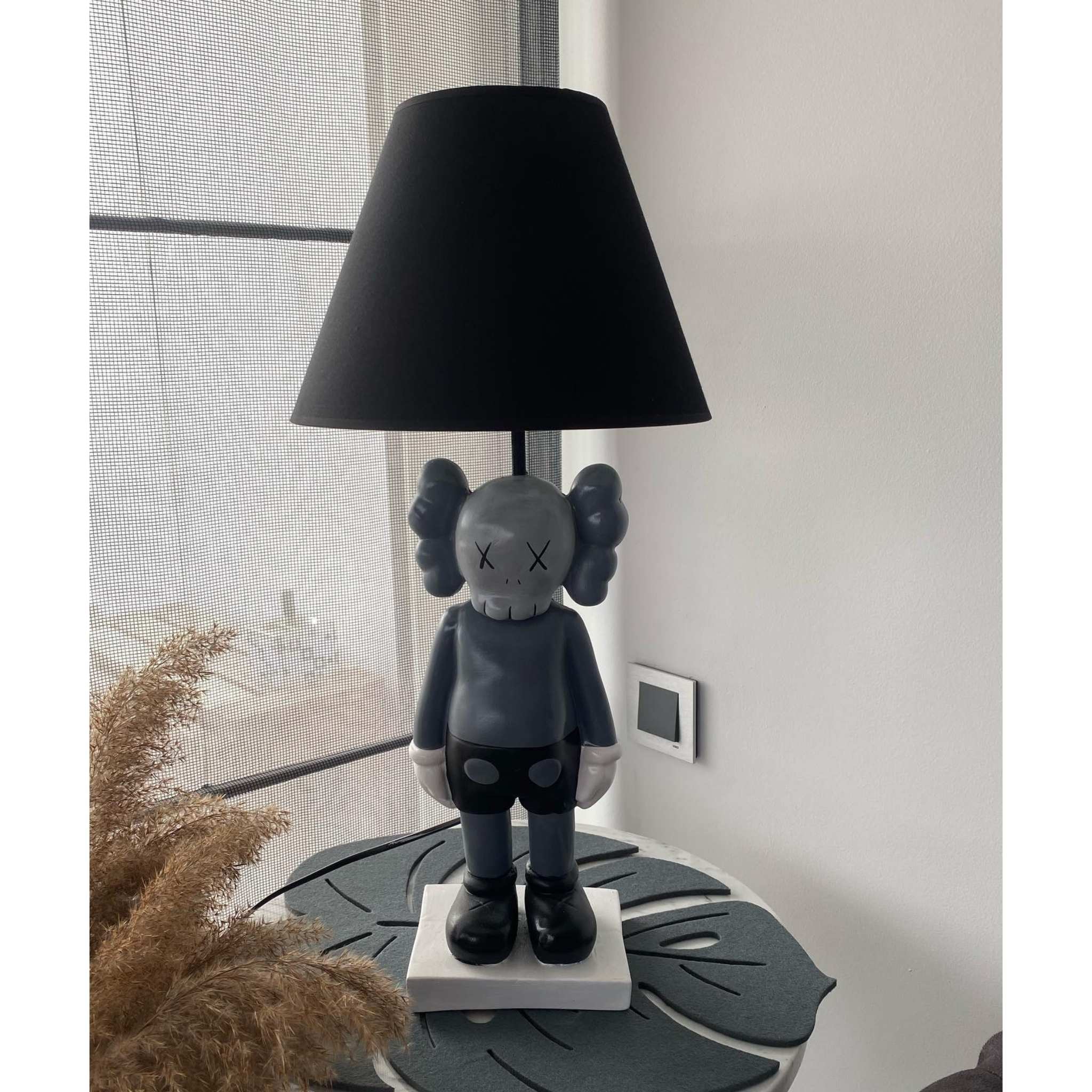 Illuminated Grey: The KAWS Sculpture with Lampshade