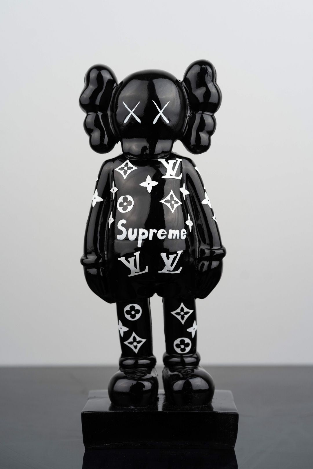 Supreme Shadow: The Black Supreme KAWS Figure